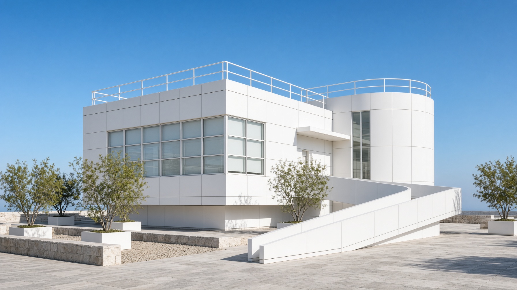 Daylight view of the white porcelain-enamel pavilion, a cylinder meeting a strict window grid under a clear sky.